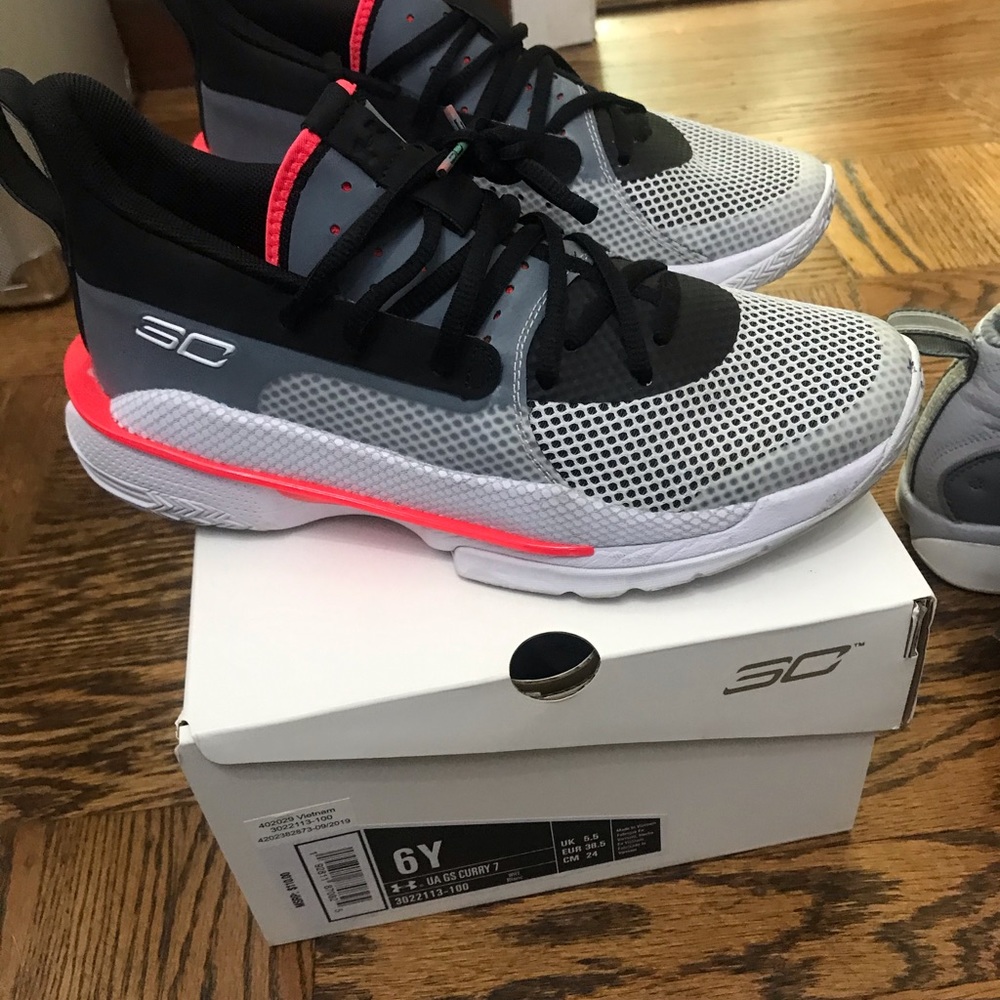 2 pairs of Basketball shoes ( barely used )